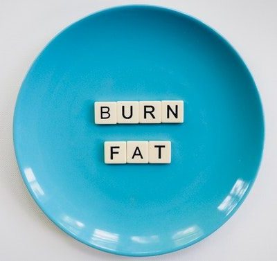 photo-of-a-burn-fat-text-on-round-blue-plate-2383009-compressor